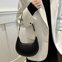 Moon Shaped Baseball Bag Showing