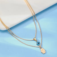 Evil Eye & Hamsa Necklace